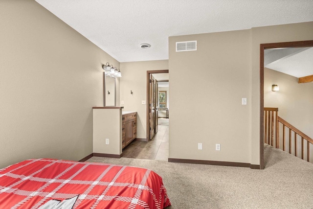 416 Sommers St, Stevens Point, WI 54481 - bedroom with light colored carpet and a textured ceiling