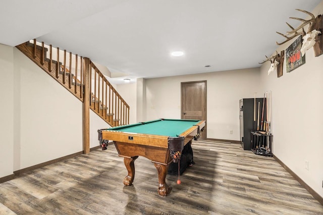 416 Sommers St, Stevens Point, WI 54481 - playroom featuring wood finished floors, baseboards, billiards, and recessed lighting