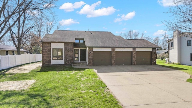416 Sommers St, Stevens Point, WI 54481 - mid-century home with brick siding, a garage, driveway, and a shingled roof