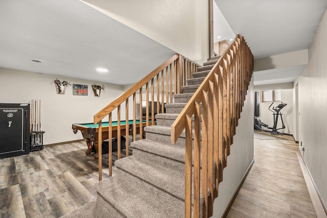 416 Sommers St, Stevens Point, WI 54481 - stairs with wood finished floors, pool table, baseboards, and recessed lighting