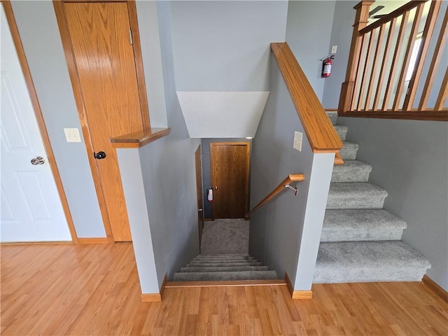 13570 42nd Ave, Chippewa Falls, WI 54729 - stairway featuring wood finished floors and baseboards