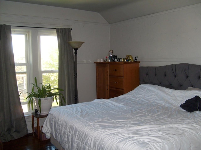 701 Otter Ave, Oshkosh, WI 54901 - bedroom with vaulted ceiling and wood finished floors