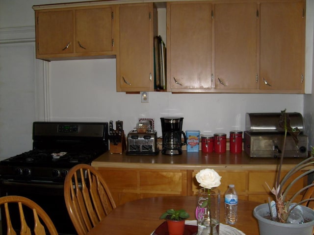 701 Otter Ave, Oshkosh, WI 54901 - kitchen featuring black gas range
