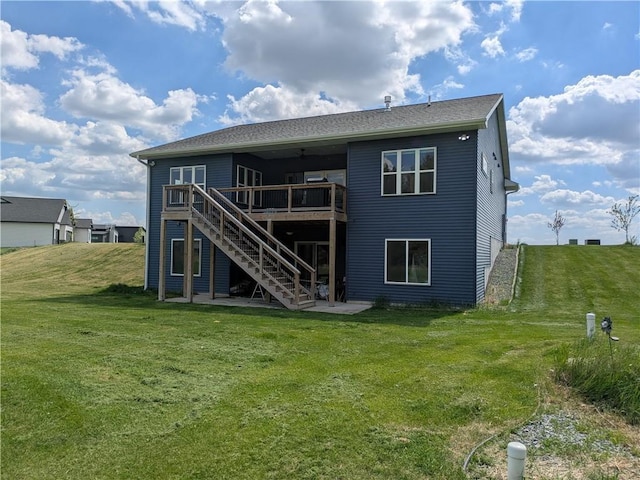 20398 64th Ave, Chippewa Falls, WI 54729 - back of property with a wooden deck, stairs, a lawn, and ceiling fan