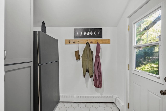 3486 Hargrove St, Madison, WI 53714 - doorway featuring light tile patterned floors and a baseboard heating unit