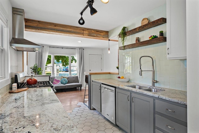3486 Hargrove St, Madison, WI 53714 - kitchen with stainless steel dishwasher, exhaust hood, gray cabinetry, a sink, and open shelves