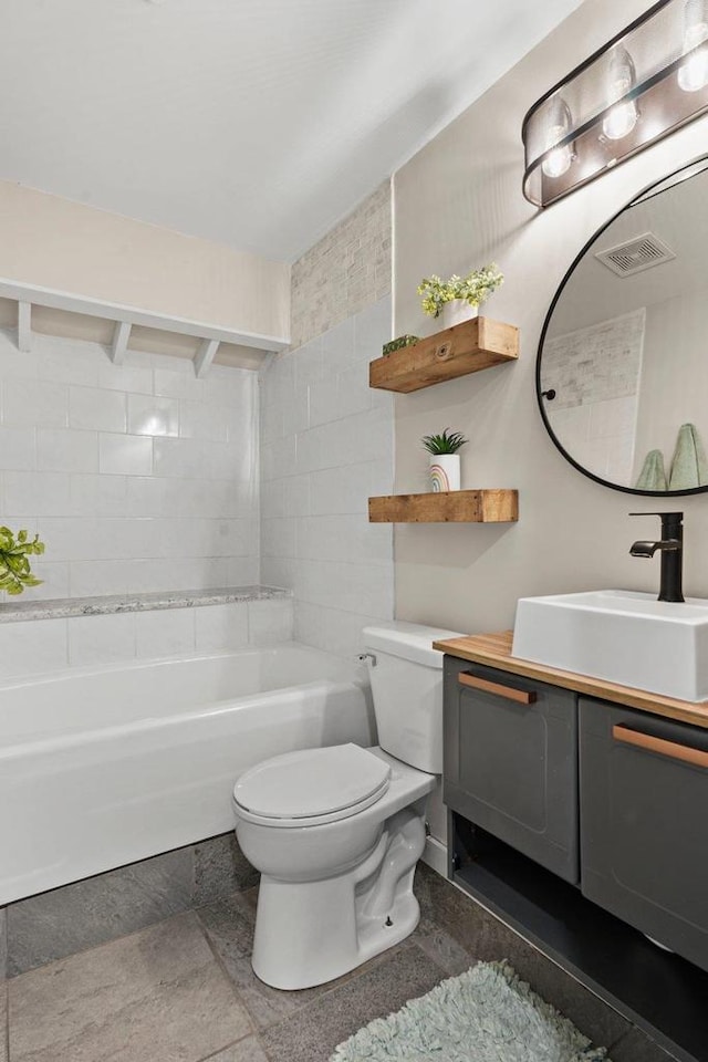 3486 Hargrove St, Madison, WI 53714 - bathroom with toilet, vanity, and bathtub / shower combination