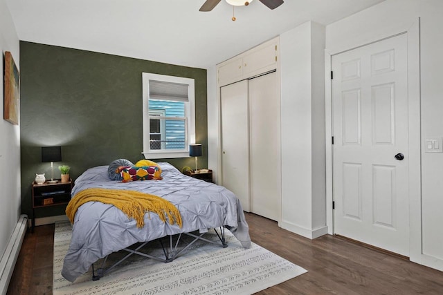 3486 Hargrove St, Madison, WI 53714 - bedroom with a baseboard radiator, wood finished floors, baseboards, a closet, and a ceiling fan