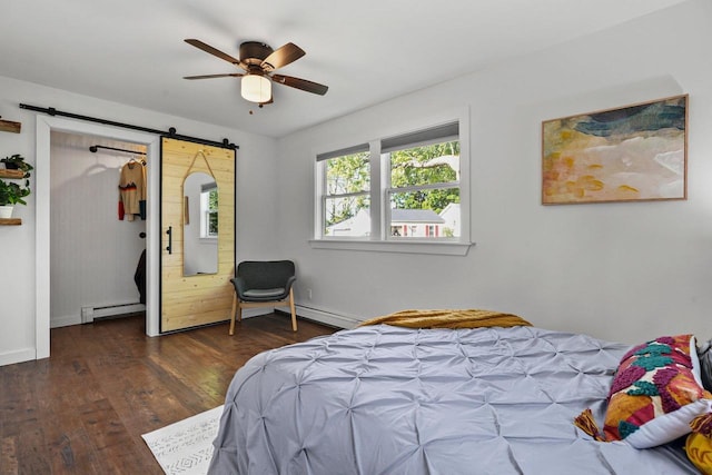 3486 Hargrove St, Madison, WI 53714 - bedroom with a barn door, a baseboard heating unit, wood finished floors, and baseboards