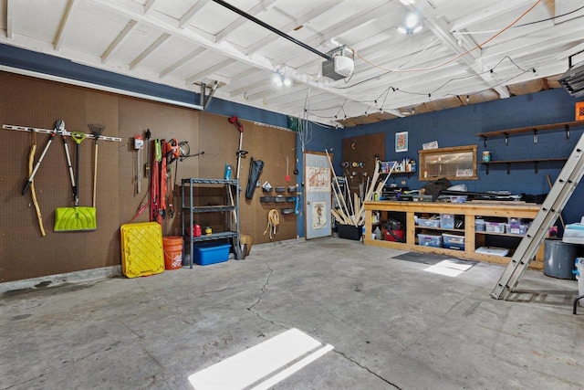 3486 Hargrove St, Madison, WI 53714 - garage featuring a workshop area and a garage door opener