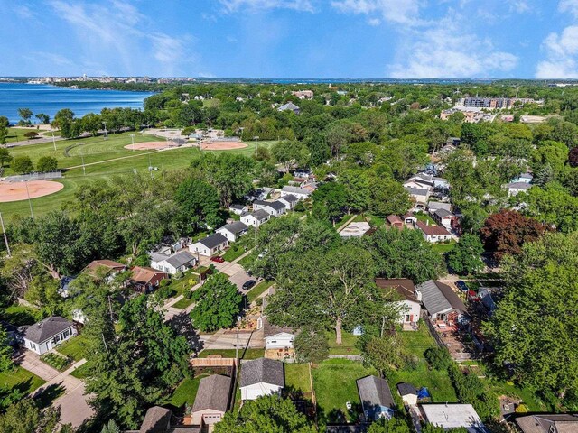 3486 Hargrove St, Madison, WI 53714 - aerial overview of property's location with a large body of water, nearby suburban area, and a tree filled landscape