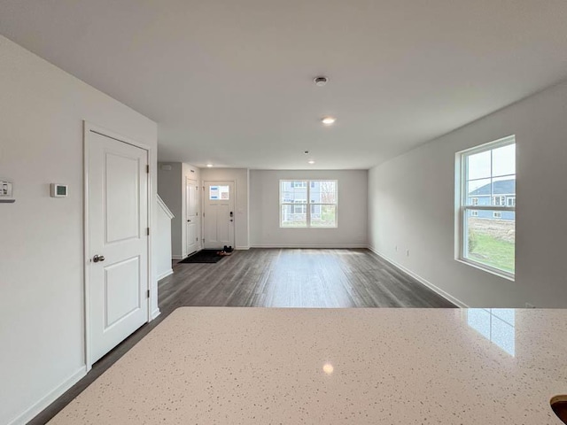 1126 58th Rd, Union Grove, WI 53182 - unfurnished living room with recessed lighting, baseboards, and dark wood-style flooring