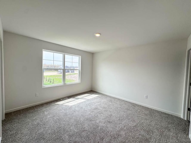 1126 58th Rd, Union Grove, WI 53182 - spare room featuring carpet and baseboards