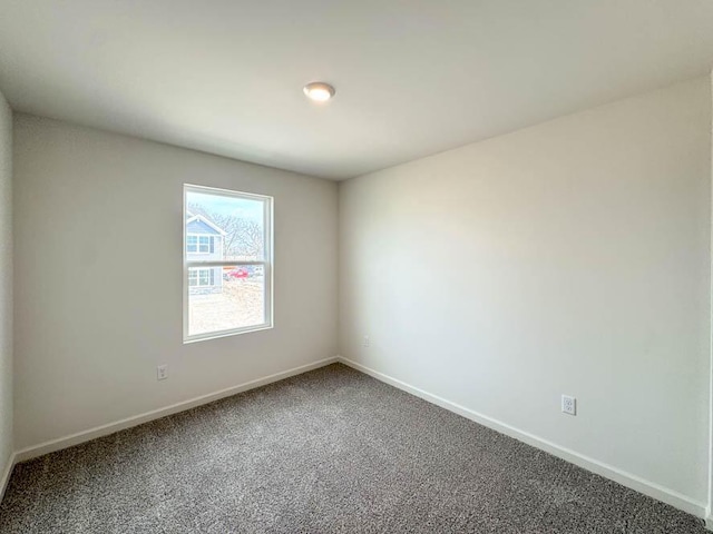 1126 58th Rd, Union Grove, WI 53182 - empty room with baseboards and carpet flooring