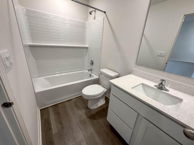1126 58th Rd, Union Grove, WI 53182 - bathroom featuring wood finished floors,  shower combination, toilet, and vanity