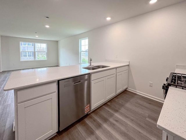 1126 58th Rd, Union Grove, WI 53182 - kitchen featuring stainless steel appliances, a sink, a peninsula, healthy amount of natural light, and recessed lighting