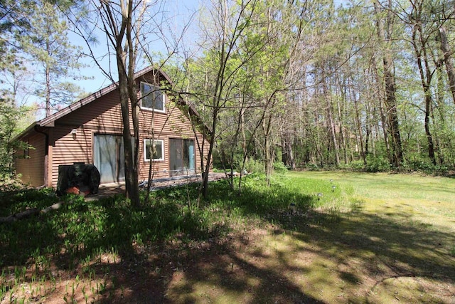 N9394 21st Ave, Neshkoro, WI 54960 - view of side of home featuring a yard