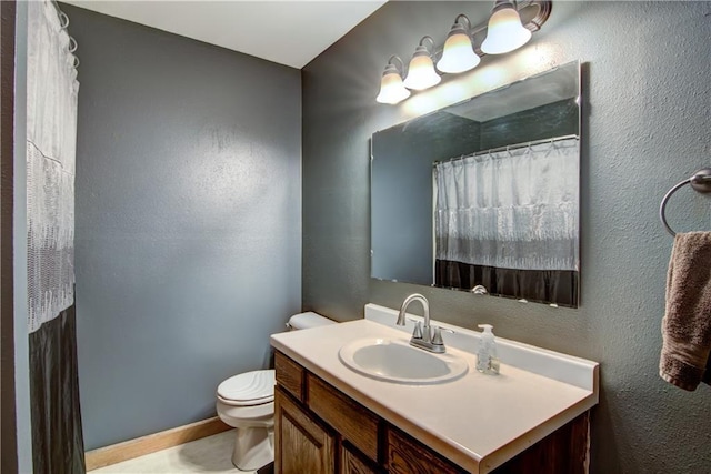 N492 County Road D, Eau Galle, WI 54737 - bathroom featuring toilet, vanity, and curtained shower