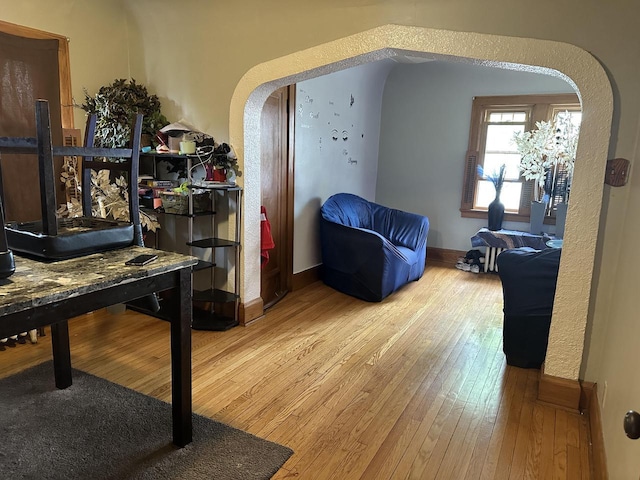 5733 W Philip Pl, Milwaukee, WI 53216 - sitting room with hardwood / wood-style flooring, baseboards, and arched walkways