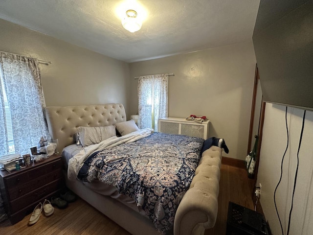 5733 W Philip Pl, Milwaukee, WI 53216 - bedroom with wood finished floors and baseboards
