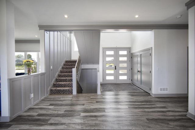 entrance foyer featuring stairway, french doors, dark wood finished floors, recessed lighting, and baseboards