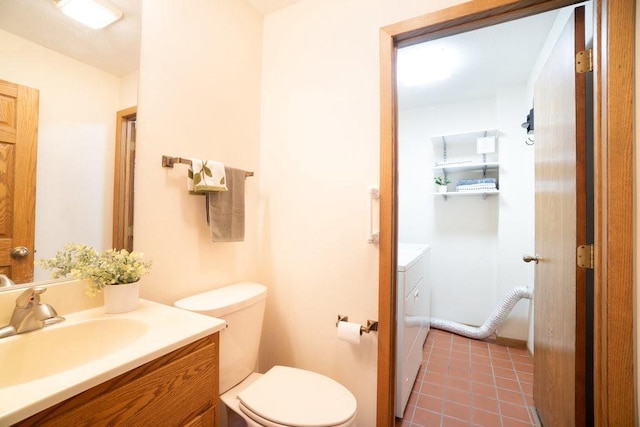 519 Grandview Heights Ct, Menomonie, WI 54751 - bathroom featuring vanity, toilet, tile patterned floors, and independent washer and dryer