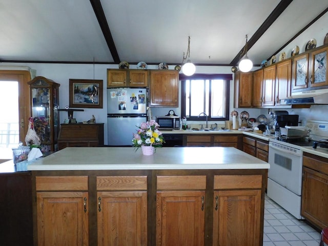 8305 Half Moon Dr, Iron River, WI 54847 - kitchen featuring appliances with stainless steel finishes, under cabinet range hood, a sink, light countertops, and brown cabinetry