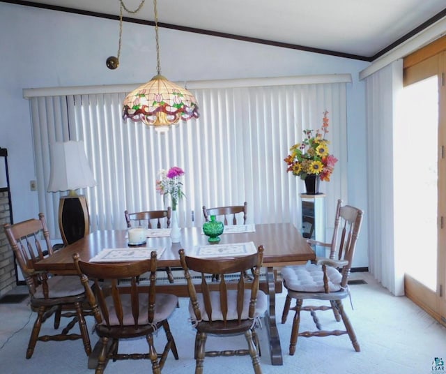 8305 Half Moon Dr, Iron River, WI 54847 - dining space featuring light carpet and lofted ceiling
