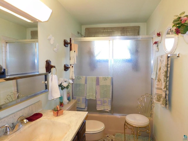 8305 Half Moon Dr, Iron River, WI 54847 - bathroom featuring shower / bath combination with glass door, toilet, and vanity