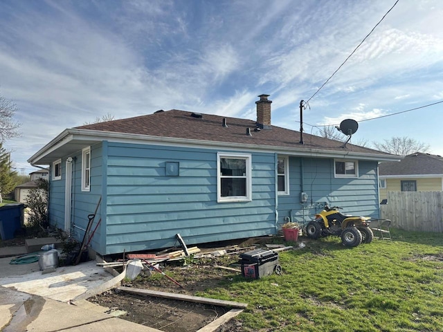 8210 W Winfield Ave, Milwaukee, WI 53218 - rear view of house with a chimney