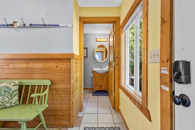 N5101 Hemlock St, Poynette, WI 53955 - corridor with a sink, light tile patterned floors, and baseboards