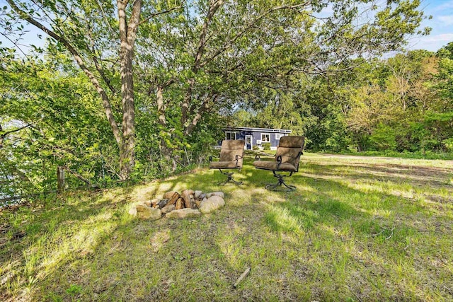 N5101 Hemlock St, Poynette, WI 53955 - view of yard with a wooded view