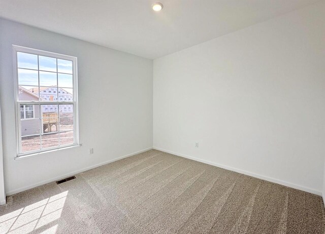 2833 Jackson St, Stoughton, WI 53589 - empty room with carpet flooring and baseboards