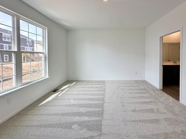 2833 Jackson St, Stoughton, WI 53589 - spare room with carpet flooring and baseboards