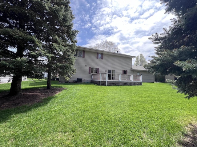 1012 Silent Sunday Ct, Racine, WI 53402 - back of property featuring a deck, a yard, and central air condition unit