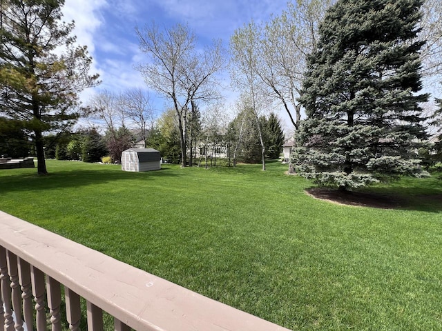1012 Silent Sunday Ct, Racine, WI 53402 - view of green lawn featuring a storage shed and an outdoor structure