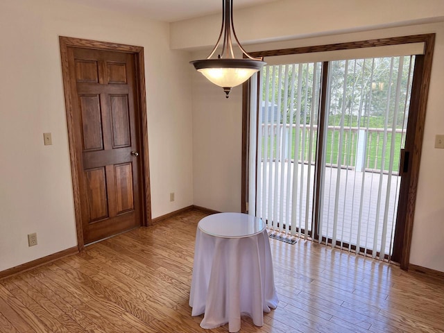 1012 Silent Sunday Ct, Racine, WI 53402 - spare room with light wood finished floors and baseboards