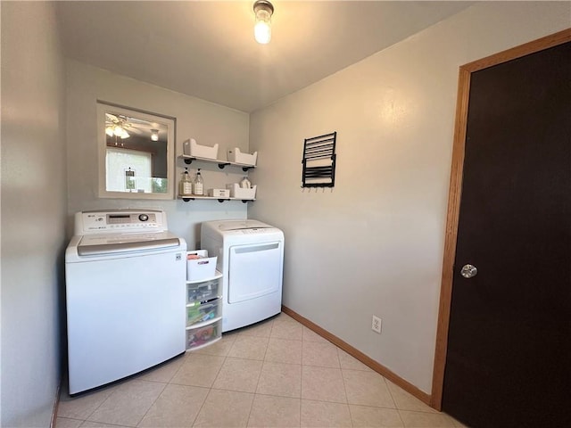 806 W Elm St, Chippewa Falls, WI 54729 - laundry room with washer and clothes dryer, light tile patterned flooring, baseboards, and ceiling fan