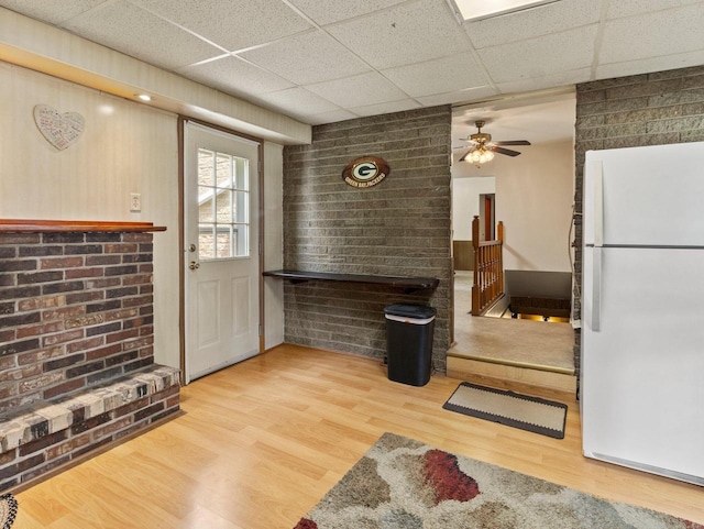 6043 N 118th St, Milwaukee, WI 53225 - kitchen featuring freestanding refrigerator, wood finished floors, a paneled ceiling, and a ceiling fan