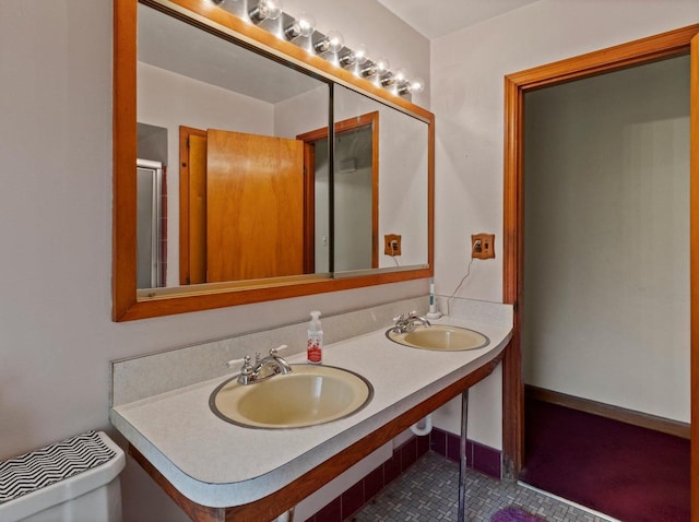 6043 N 118th St, Milwaukee, WI 53225 - bathroom with toilet, tile patterned flooring, and double vanity