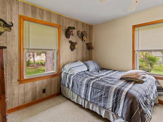 6043 N 118th St, Milwaukee, WI 53225 - carpeted bedroom with wood walls and baseboards