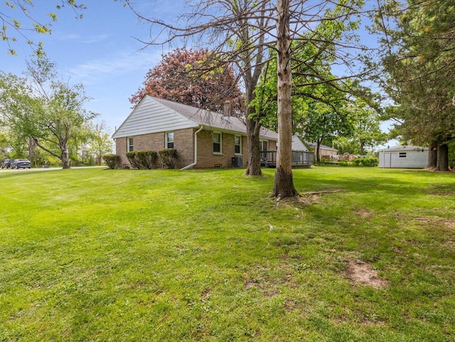6043 N 118th St, Milwaukee, WI 53225 - view of green lawn featuring central air condition unit