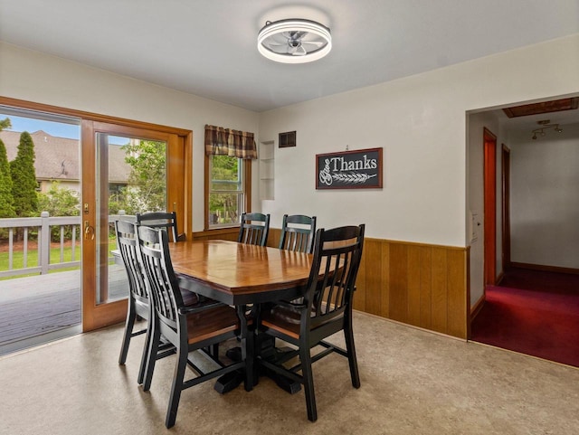 6043 N 118th St, Milwaukee, WI 53225 - dining room featuring wainscoting and wood walls