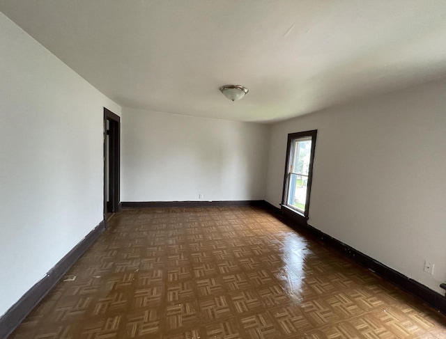 6121 12th Ave, Kenosha, WI 53143 - empty room with baseboards