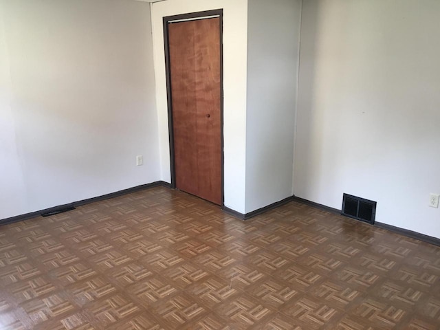 6121 12th Ave, Kenosha, WI 53143 - spare room featuring baseboards