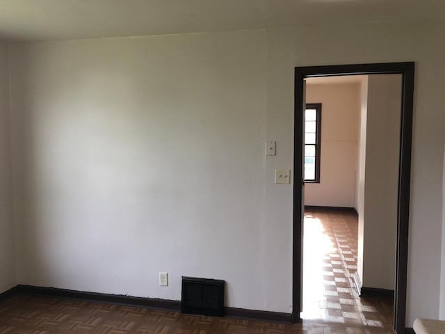 6121 12th Ave, Kenosha, WI 53143 - spare room featuring baseboards