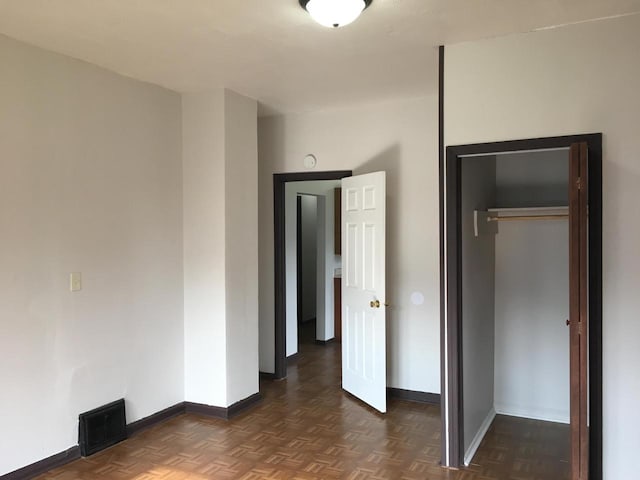6121 12th Ave, Kenosha, WI 53143 - unfurnished bedroom with baseboards and a closet