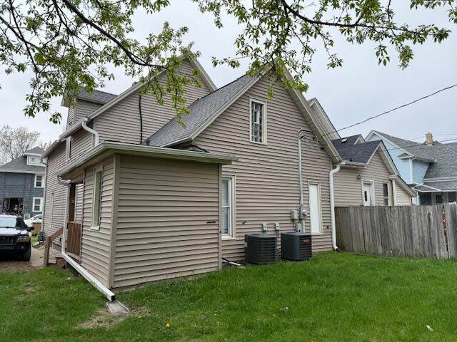 6121 12th Ave, Kenosha, WI 53143 - rear view of house featuring central AC