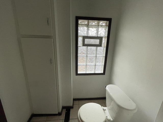 6121 12th Ave, Kenosha, WI 53143 - half bathroom featuring toilet and tile patterned floors