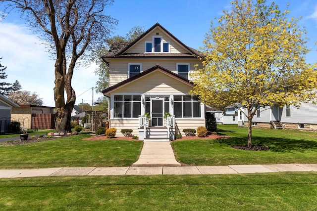 61 N Grand St, Markesan, WI 53946 - traditional style home with a sunroom and a front lawn